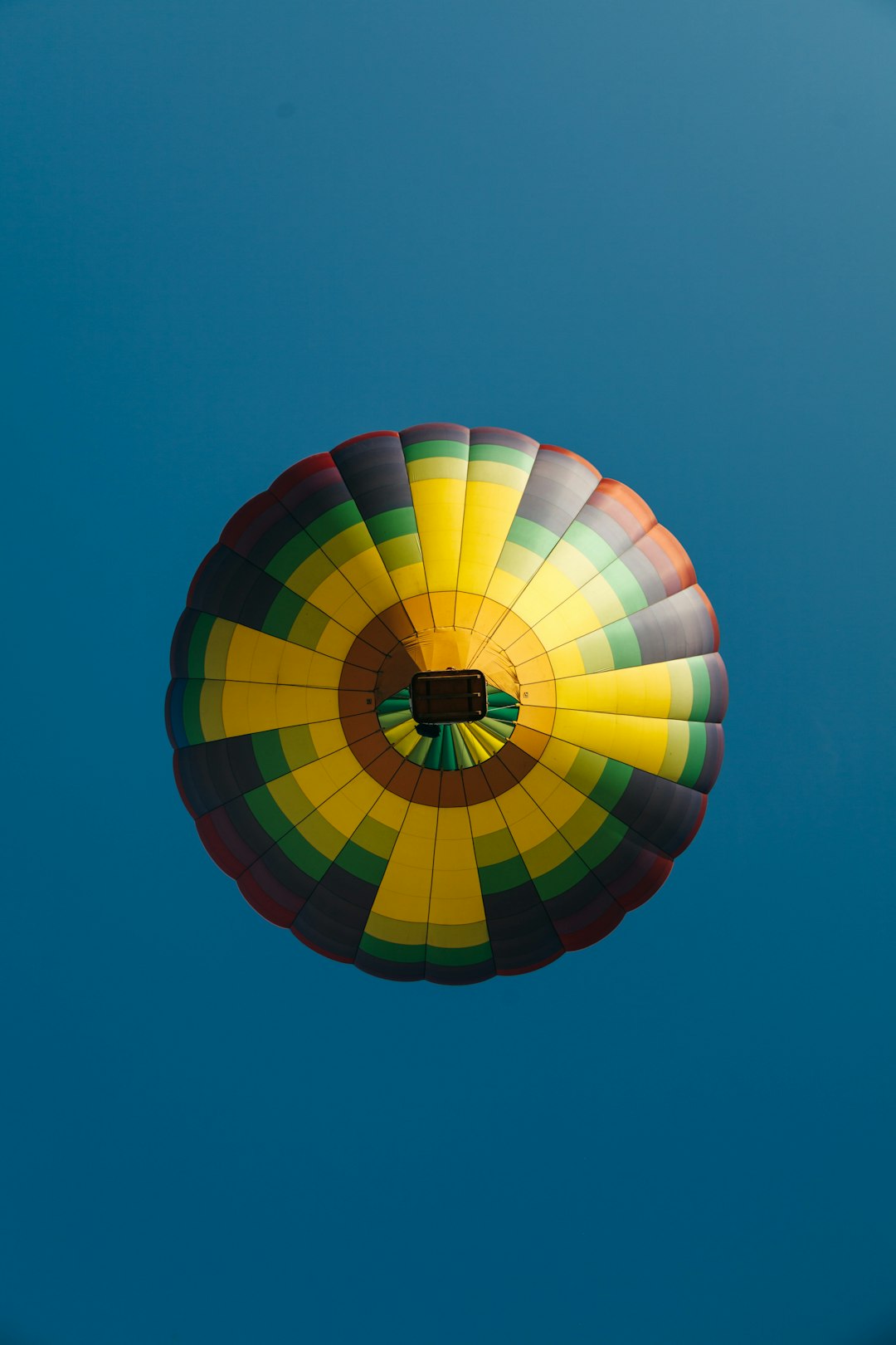 Shot from directly underneath a hot air balloon taking off at the 47th Annual Adirondack Balloon Festival in Queensbury, NY.